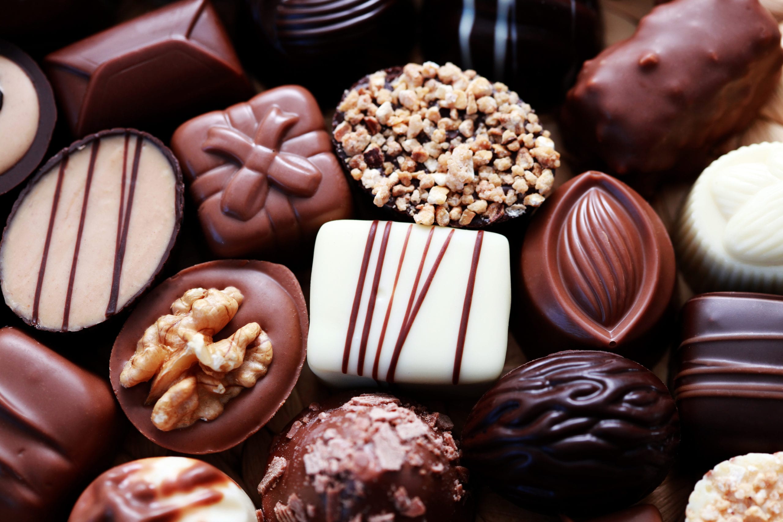 bigstock-various-chocolates-as-a-backgr-48562157