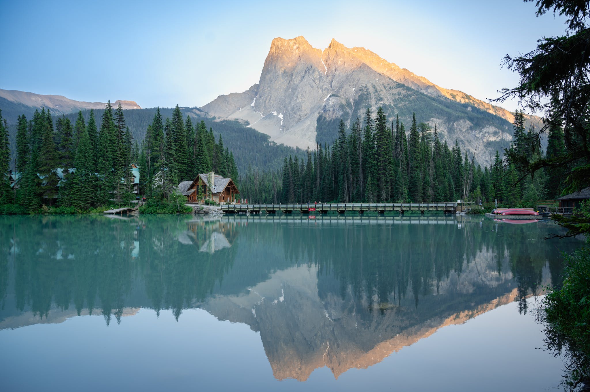 Lodge at the foot of Mount Burgess Reflecting in the Waters of Emerald Lake in Yoho National Park Canada